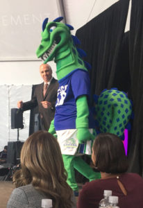 Finger Lakes Community College's President Robert Nye with the school's mascot.