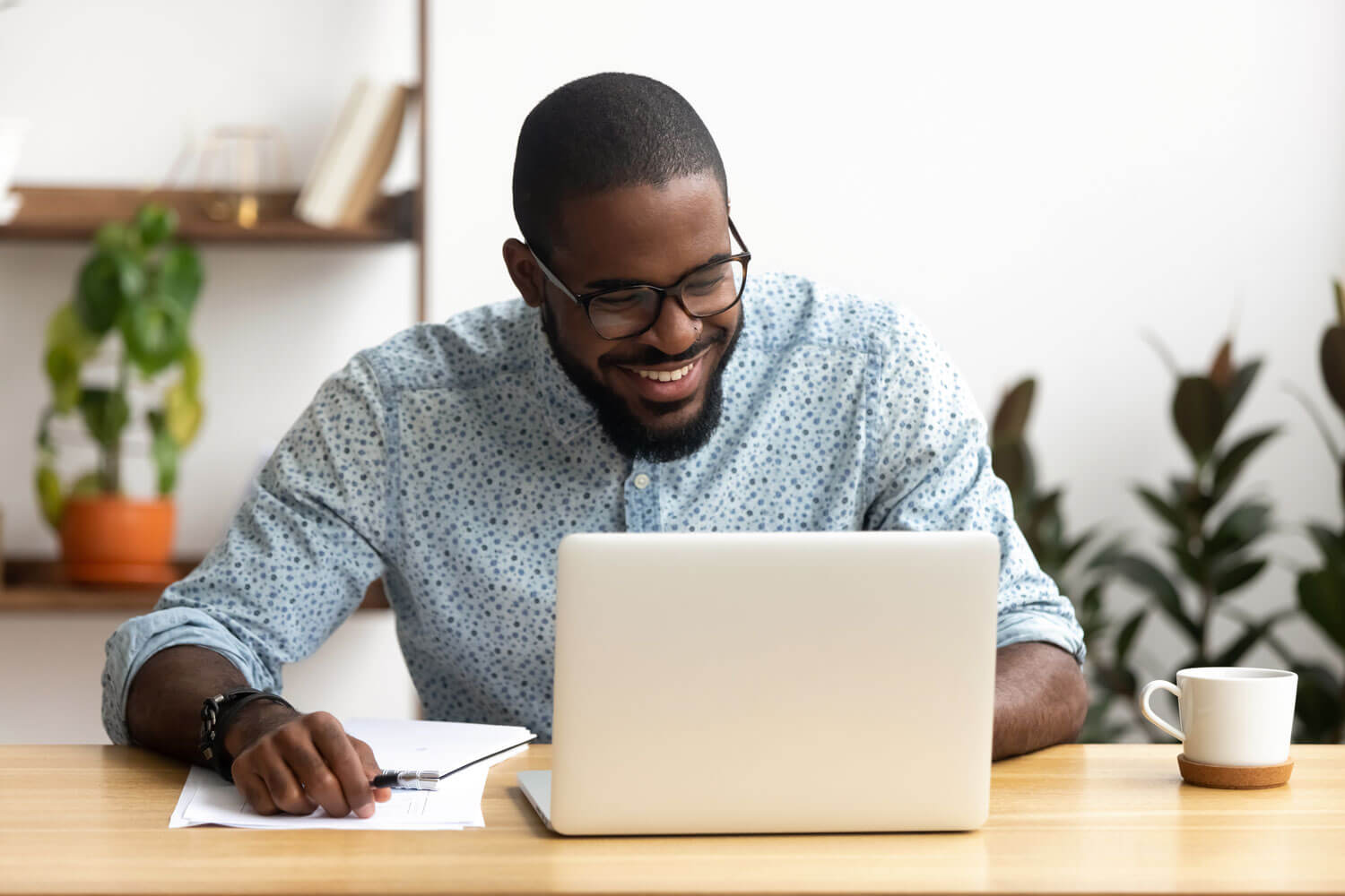  young man using laptop 