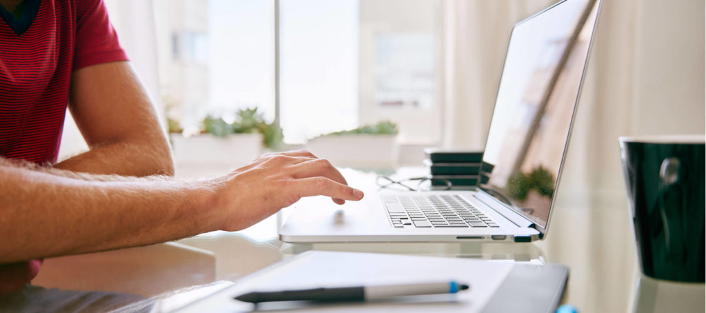 man using laptop